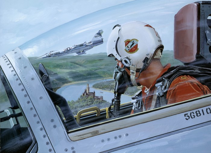 Pilot in cockpit with F-104 Starfighter flying over castle