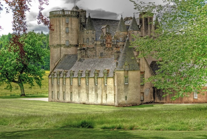 Castle Fraser, a historic Scottish castle surrounded by greenery