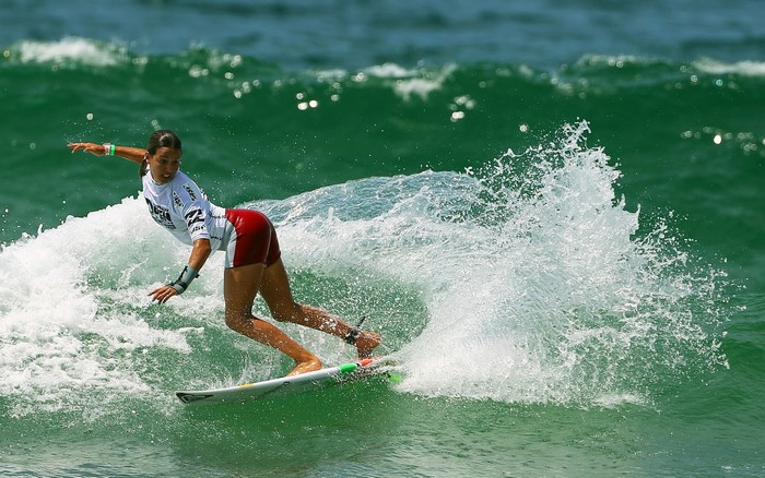 Surfer riding a wave