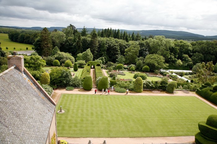 Formal garden with manicured hedges and trees