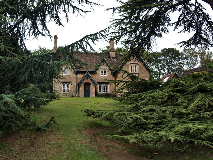 Stone house with green trim in the United Kingdom