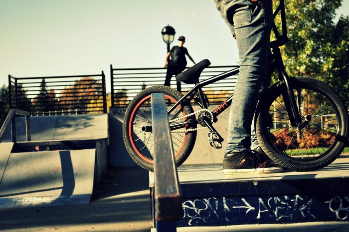 Person on BMX bike at skatepark