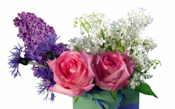 Bouquet of pink roses, purple hyacinth, and white lilacs