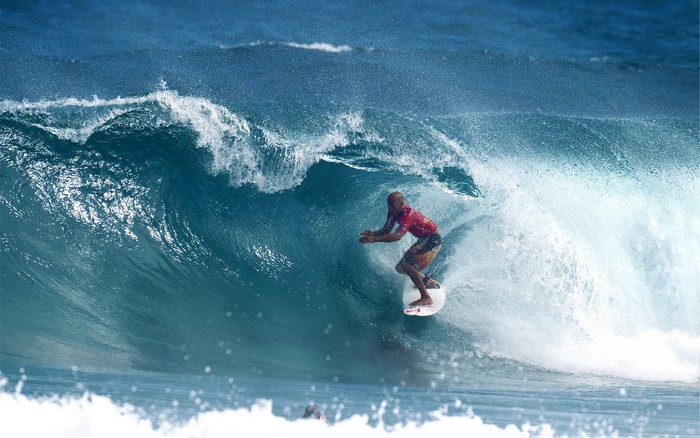 Surfer riding a large wave