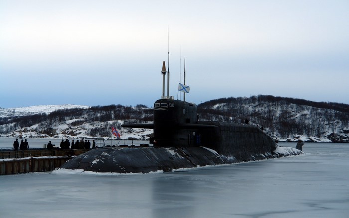 Russian submarine docked in icy waters