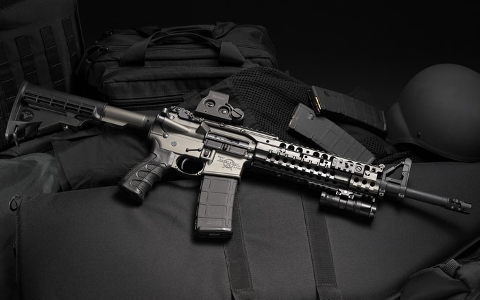 Assault rifle with tactical gear