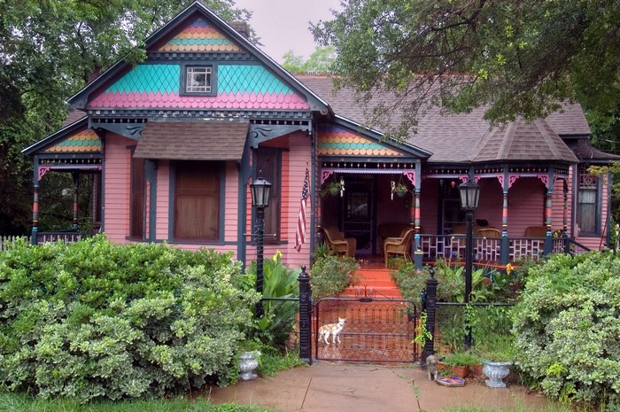 Pink Victorian House in Texas with Colorful Trim