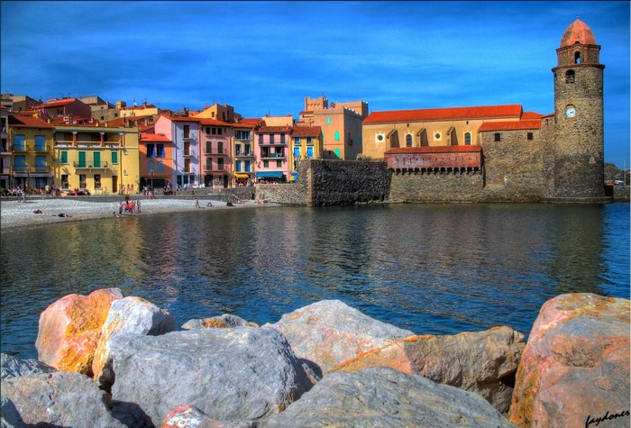 Collioure, France waterfront with colorful buildings and church tower