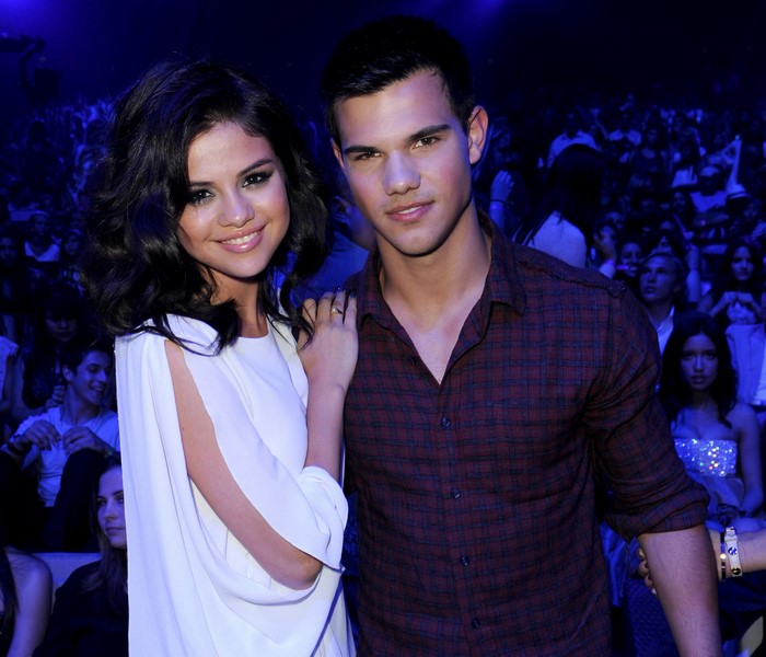 Selena Gomez and Taylor Lautner at an event