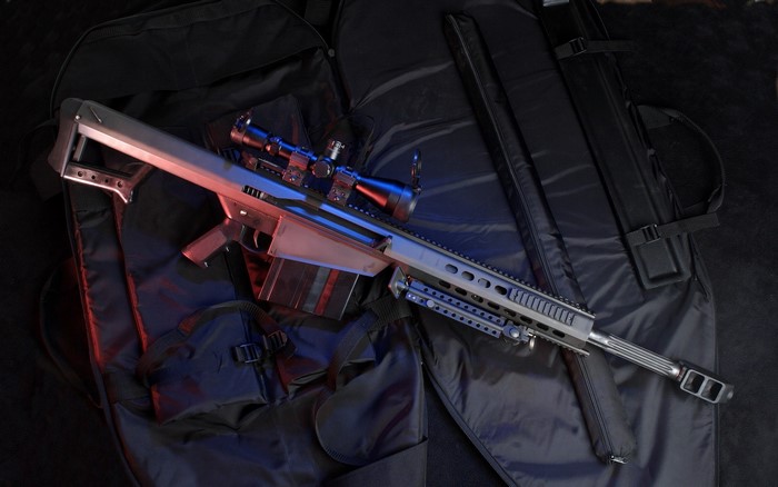 Sniper rifle with scope in a gun bag