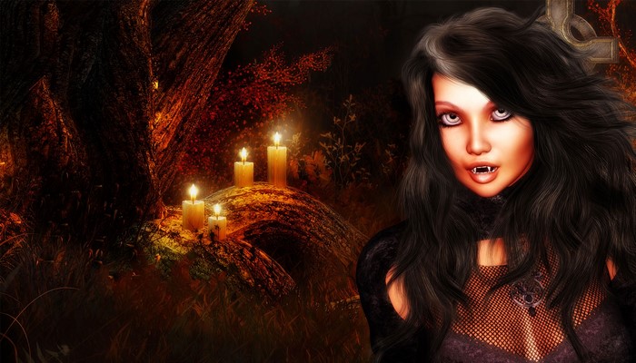 Vampire woman with fangs in a dark forest with candles