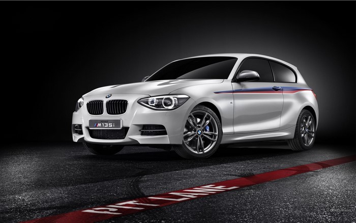 White BMW M135i on a race track