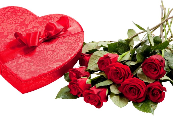 Red heart-shaped gift box with red roses
