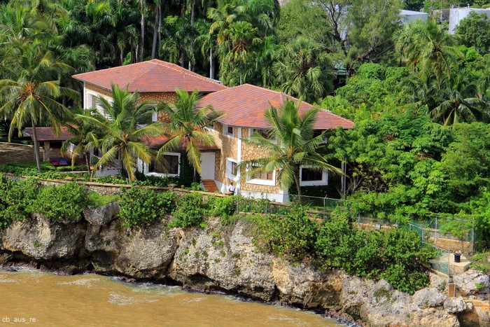 Houses on a cliff overlooking the ocean
