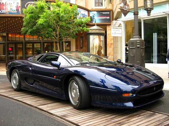 Jaguar XJ220 parked on wooden planks