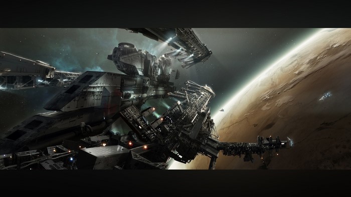 Massive space station and ships near a planet