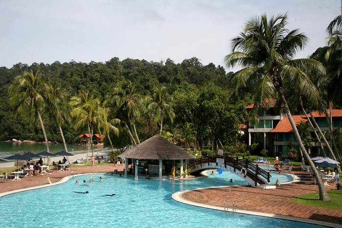 Resort with swimming pools and palm trees