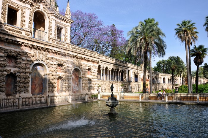 Alcázar of Seville gardens with fountain