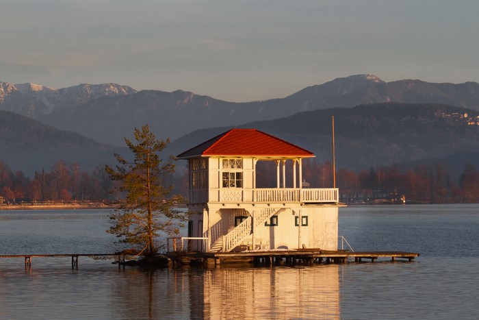 White house on a lake in Austria