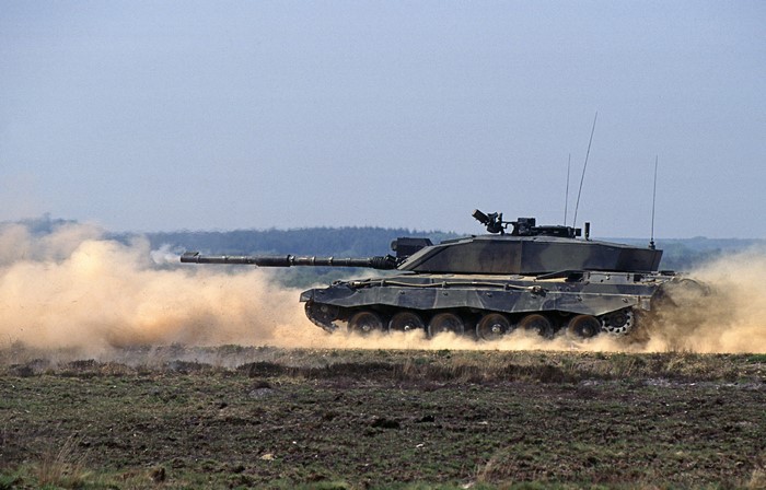 Challenger 2 tank firing in a field