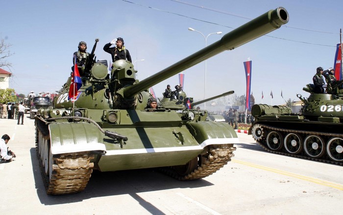 Cambodian tanks with soldiers in a parade