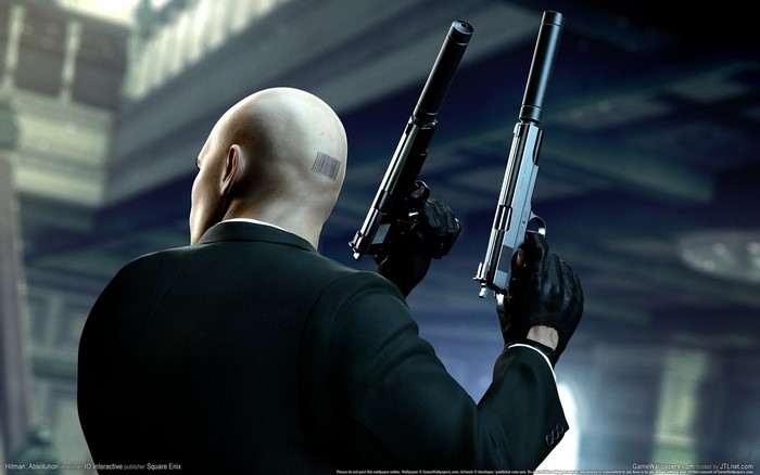 Agent 47 from Hitman holding two pistols