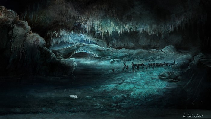 Cave with stalactites and a small boat
