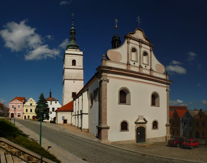 Church and bell tower in a European town square