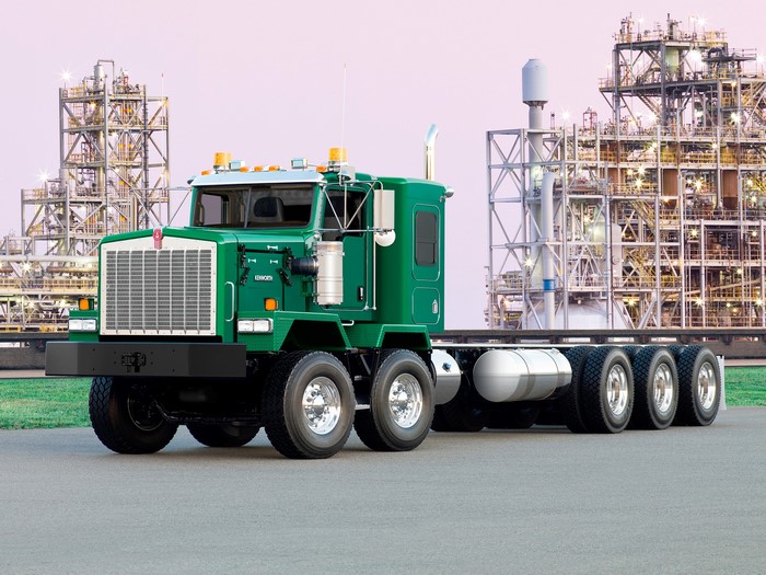 Green Kenworth Truck at Industrial Facility