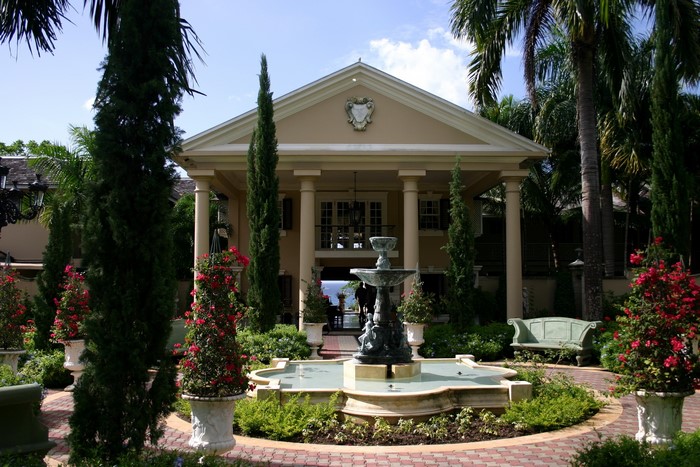Mansion with fountain and garden