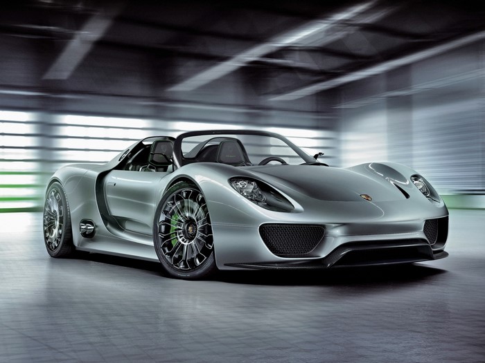 Silver Porsche 918 Spyder in a Garage