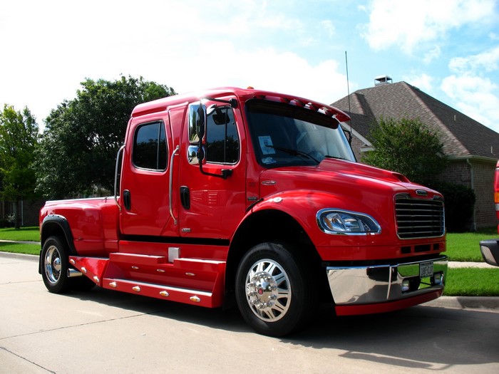 Red Freightliner truck with crew cab