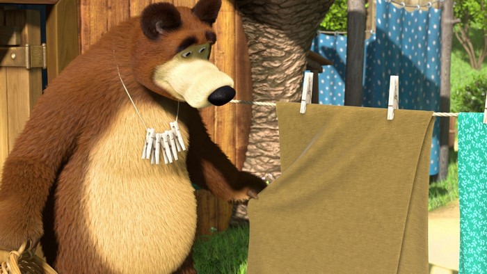 Bear from Masha and the Bear hanging laundry