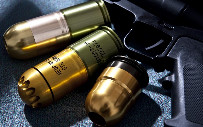 40mm HEDP cartridges and firearm