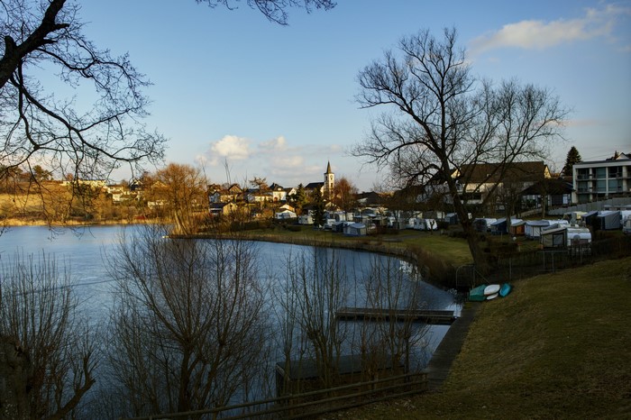 Lake with village and campground in Germany