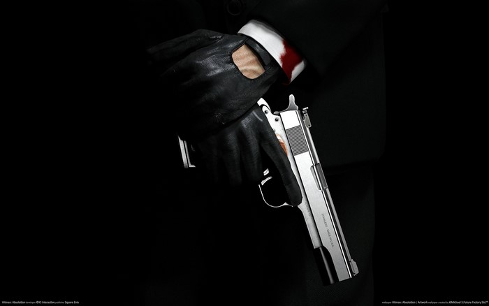 Agent 47 from Hitman holding a pistol