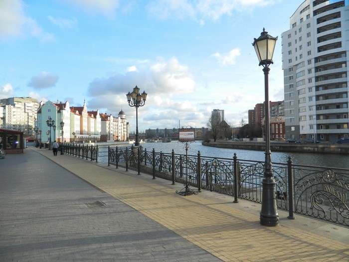Waterfront promenade with colorful buildings in Kaliningrad, Russia