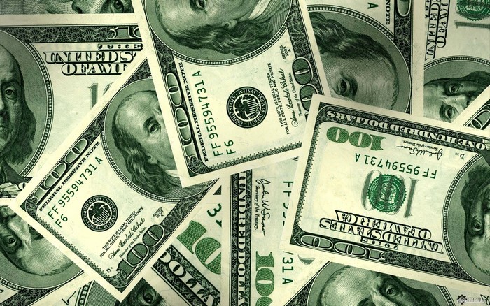 Pile of US One Hundred Dollar Bills