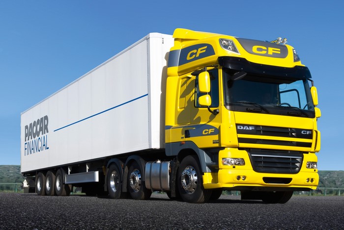 Yellow DAF CF Truck with PACCAR Financial Trailer