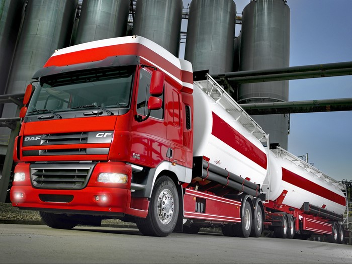 Red DAF CF tanker truck at industrial facility