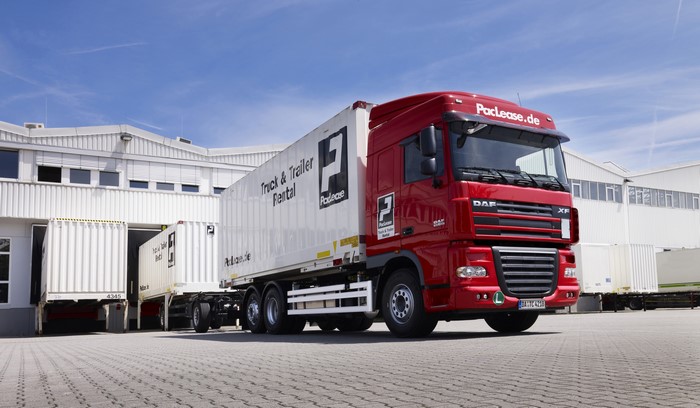Red DAF XF Truck with PacLease Trailers