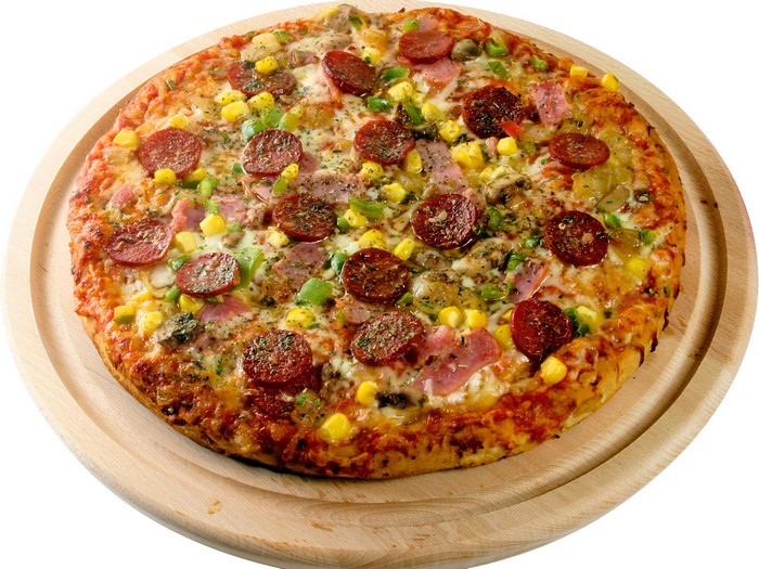Pizza with pepperoni, corn, and ham
