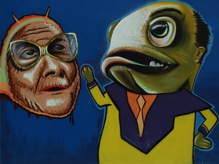 Graffiti of a fish-like creature and a mask