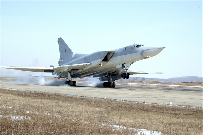 Russian Tupolev Tu-22M bomber landing on runway