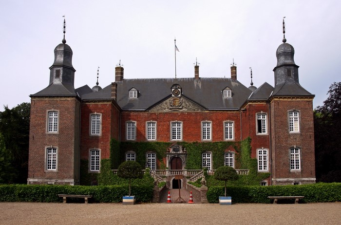 Castle with red brick facade and two towers