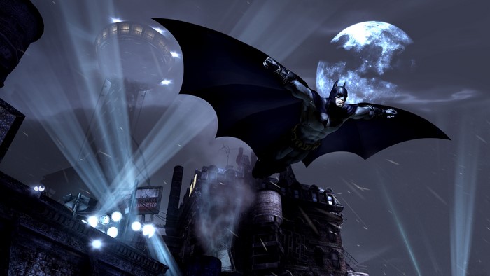Batman gliding over Gotham City at night