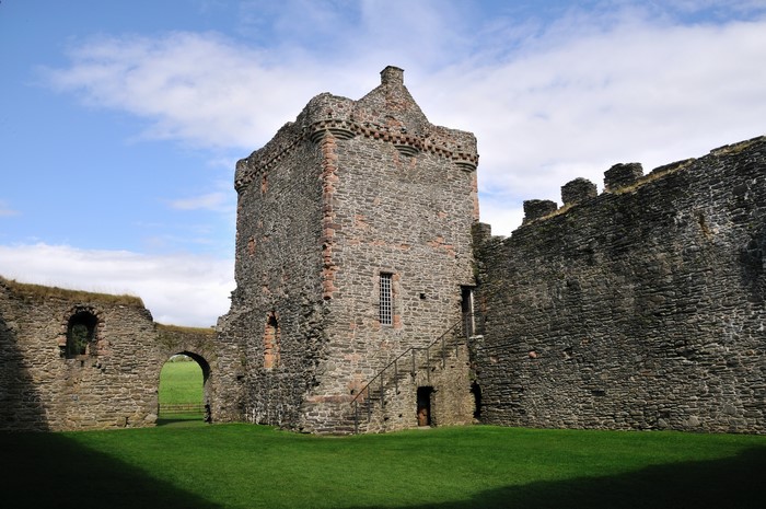 Skipness Castle ruins with tower and walls