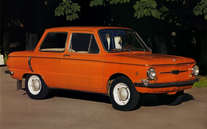 Orange retro Russian car parked outdoors