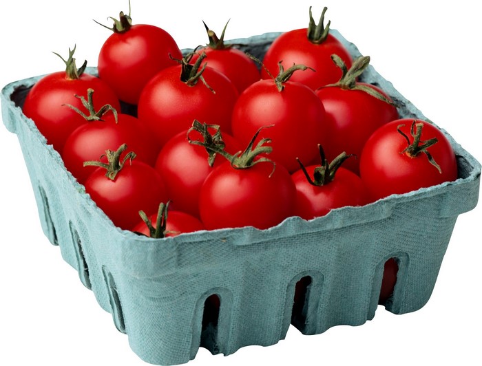 A carton of fresh red tomatoes