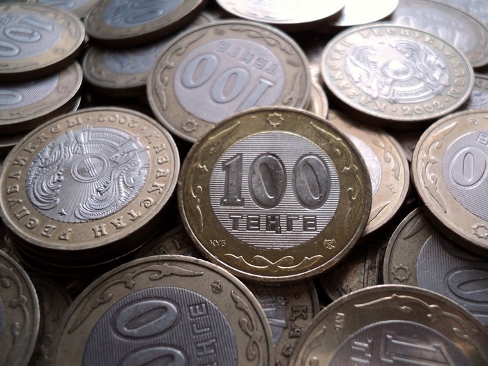 Pile of 100 Tenge coins from Kazakhstan